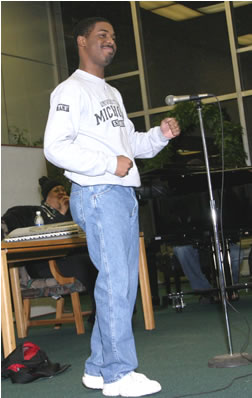 Choir director leading choir practice 